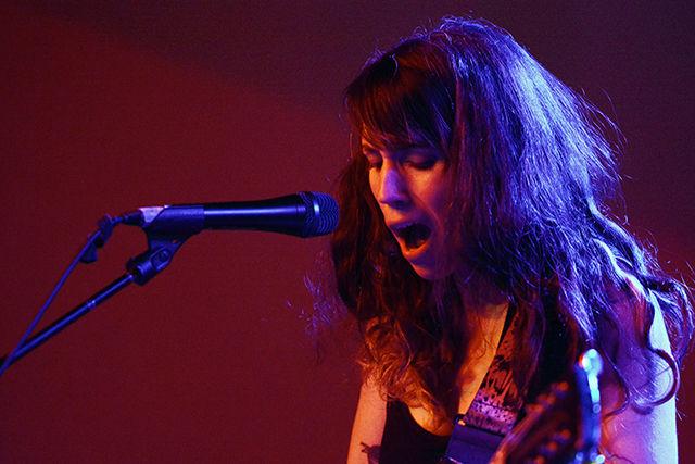 Aim&#233;e Argote, lead vocalist for Des Ark, sings during the Double Barrel Benefit for WKNC. The event, which raised money for the college radio station, was hosted at King's Barcade in downtown Raleigh on Saturday, Feb 13, 2016.