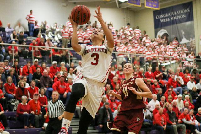 Junior guard Miah Spencer leaps for a layup in the Wolfpack's 74-63 win over Boston College on February 11, 2016. Spencer shot 7 of 15 from the field, posted 20 points, and grabbed 5 rebounds in the win at Broughton High School.