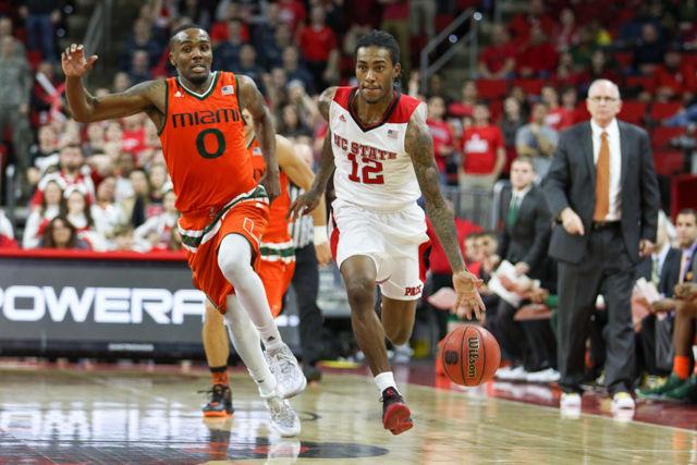 Junior Point Guard Anthony 'Cat' Barber sprints up the court, leaving the Miami players in his wake during in the second half of the game. Barber played all 40 minutes while scoring 30 points, shooting 10 for 10 from the free throw line, 10 of 18 on the court, and racking up three rebounds and four assists. The Wolfpack beat the Miami Hurricanes 85-69 on January 30th, 2016 at PNC Arena.
