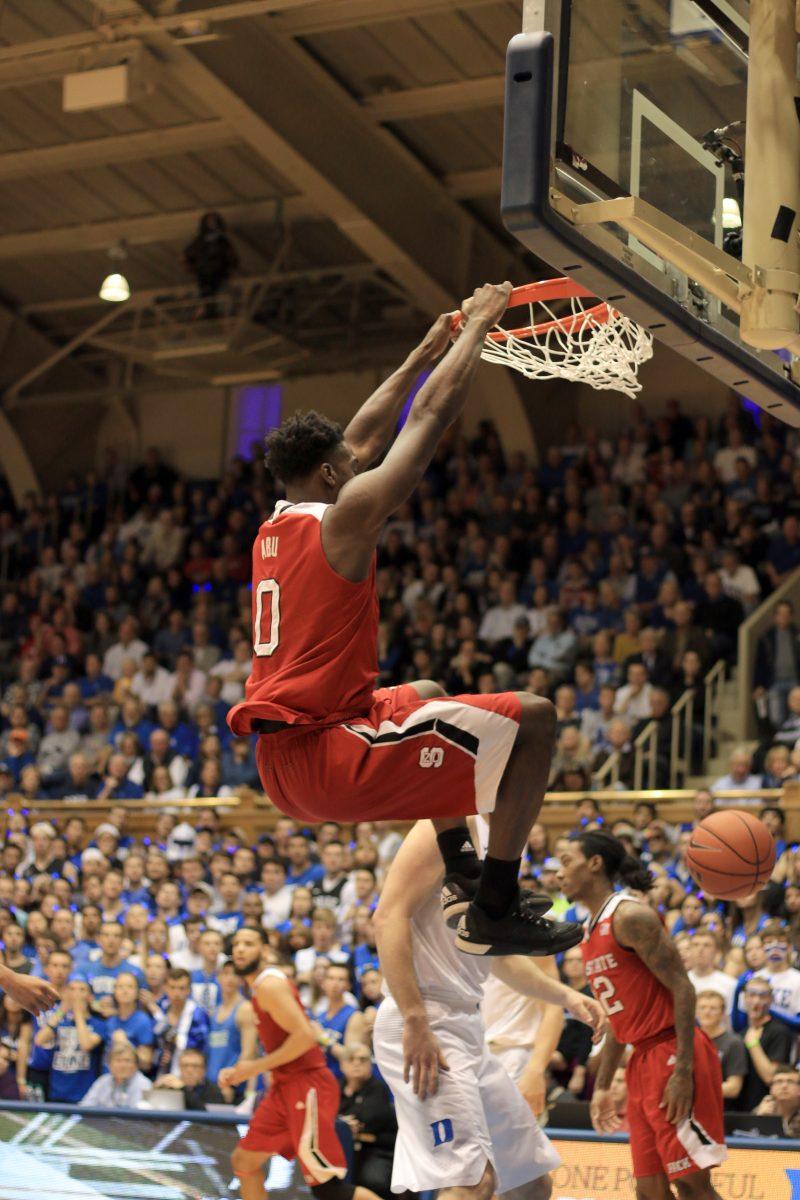 Sophomore forward Abdul-Malik Abu follows through after a dunk in the Wolfpack's 88-80 loss to Duke on February 6, 2016. Abu posted 16 points, grabbed 17 rebounds, and dished out 3 assists in the loss at Cameron Indoor Stadium.