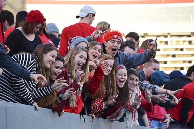 Students celebrate the win against Syracuse for the Military Appreciation Day game on Nov. 21.
