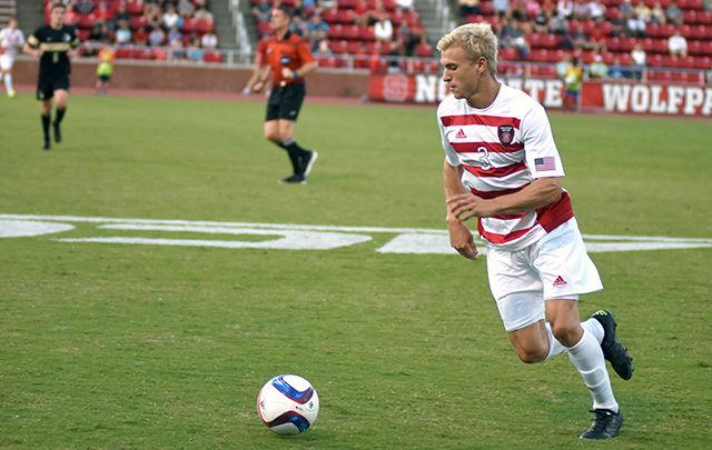 Caleb Duvernay, a sophomore defender, carries the ball upfield against Wofford on Sept. 15. The Wolfpack took the contest, held in Dail Soccer Stadium, by a score of 2-1.