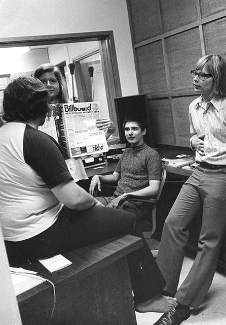 1972: Students at the WKNC office hold a Billboard magazine.&#160;