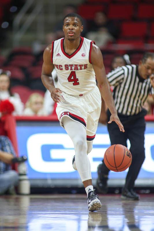 Freshman guard Dennis Smith Jr. brings the ball up court during the 100-66 win over Lynn University on Thursday in PNC Arena.