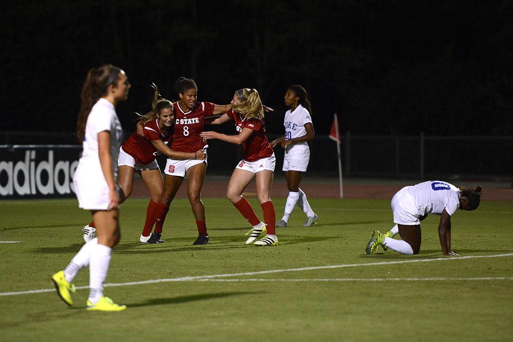 Freshman forward Kia Rankin celebrates with teammates after her goal against Duke on Oct. 9 in Dail Soccer Stadium. Rankin earned the only Wolfpack goal in its 1-3 loss against the Blue Devils.&#160;