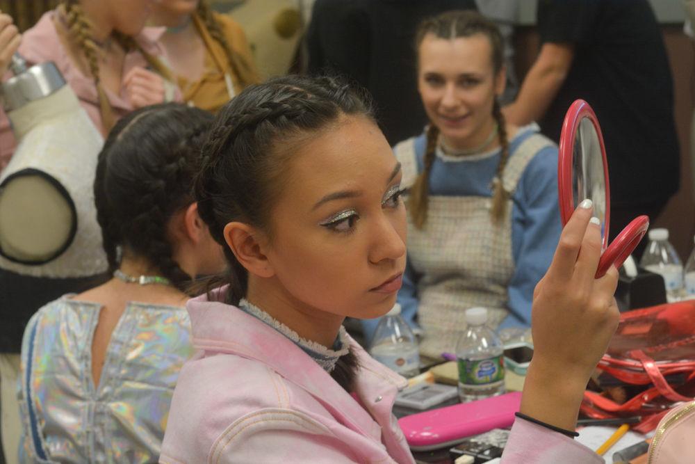 Kiana Bonollo, a model for senior Jordan Stokes, gets ready backstage for the COT Threads Senior Showcase held at the College of Textiles on Dec. 3, 2016. The Fashion and Textile Management senior and designer, Jordan Stokes created a collection called &#8220;Dreamers&#8221; which was inspired by the freedom and the limitless dreamland of young love. The textiles used are infused with youthful colors.