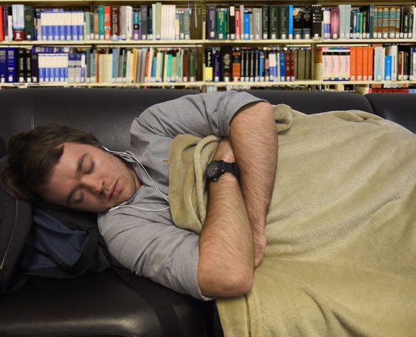 William Pilgrim, a freshman studying mechanical engineering, is sleeping peacefully in his home, also known as D.H. Hill Library. For students looking to save a couple of bucks, the Bookstacks provide a warm, safe place to secretly live. 