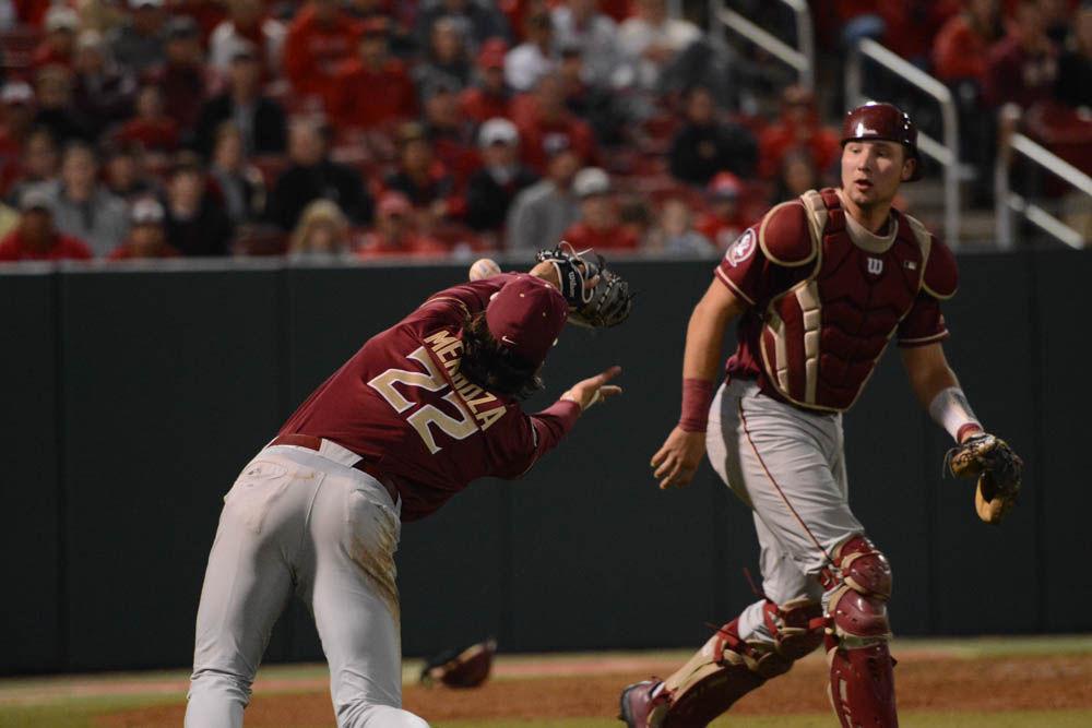 Freshmen infielder Drew Mendoza of Florida State catches the ball during at Doak Field on April 8, 2017. Wolfpack beat the Seminoles 8-4.