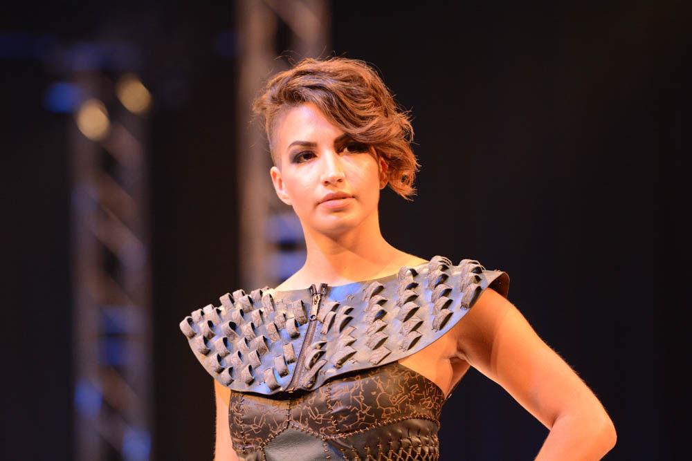 A model shows off her design created by Laura Wyker, a senior studying art and design, as part of her collection called Imposteria. The Art2Wear fashion show, which is planned and executed by the students of the College of Design, took place at Talley Student Union on April 28, 2017.