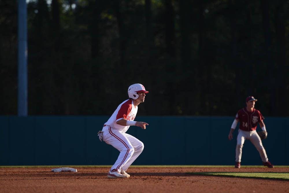 Junior outfielder Stephen Pitarra gets ready to run to third base during the baseball game against Florida State on April 8, 2017. Wolfpack won 8-4 at Doak Field.