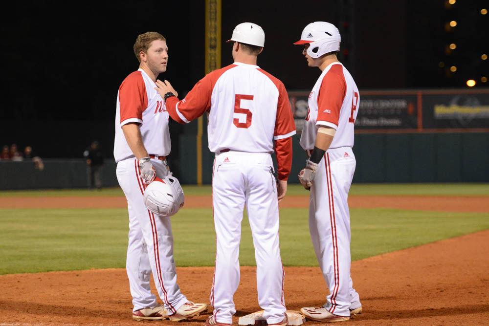 Freshmen center Brad Debo chats with his teammates in between plays at the baseball game against Florida State on April 8, 2017. Wolfpack beat the Seminoles 8-4 at Doak Field.