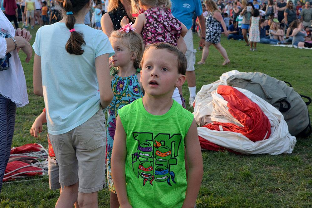Luke Lattin, 8, admires the hot air balloons at the WRAL Freedom Balloon Festival on May 27, 2017 in Fuquay-Varina. "These balloons are way cooler than any of my toys," Lattin said. The event featured more than 30 hot air balloons, food and beer vendors and live music performances.