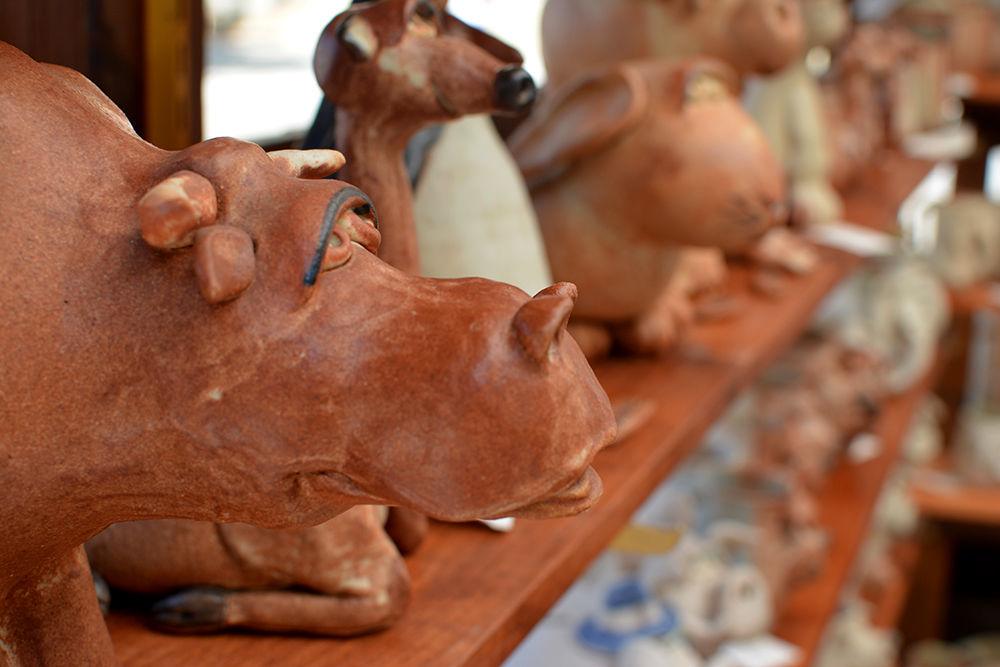 Richard Overman sells his wares at Artsplosure on May 20, 2017. A self taught artist, his sculptures range from friendly animals to scary skulls. Each piece is handcrafted and comes from Cincinnati, Ohio.