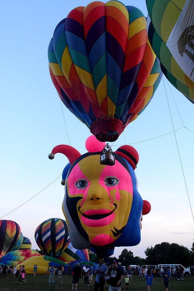 Hot air balloons begin to ascend at the WRAL Freedom Festival on May 27, 2017 in Fuquay-Varina. The event featured more than 30 hot air balloons, food and beer vendors and live music performances.