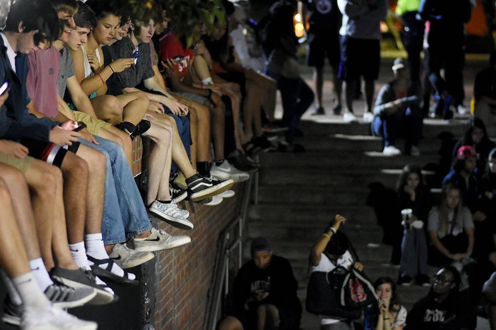 Students lined the walls above the free expression tunnel in order to get a better view of the artists freestyling at the 7th annual Cypher. This event was held on Aug. 28 outside the Free Expression Tunnel and will continue to be held every Monday night starting at 9pm.