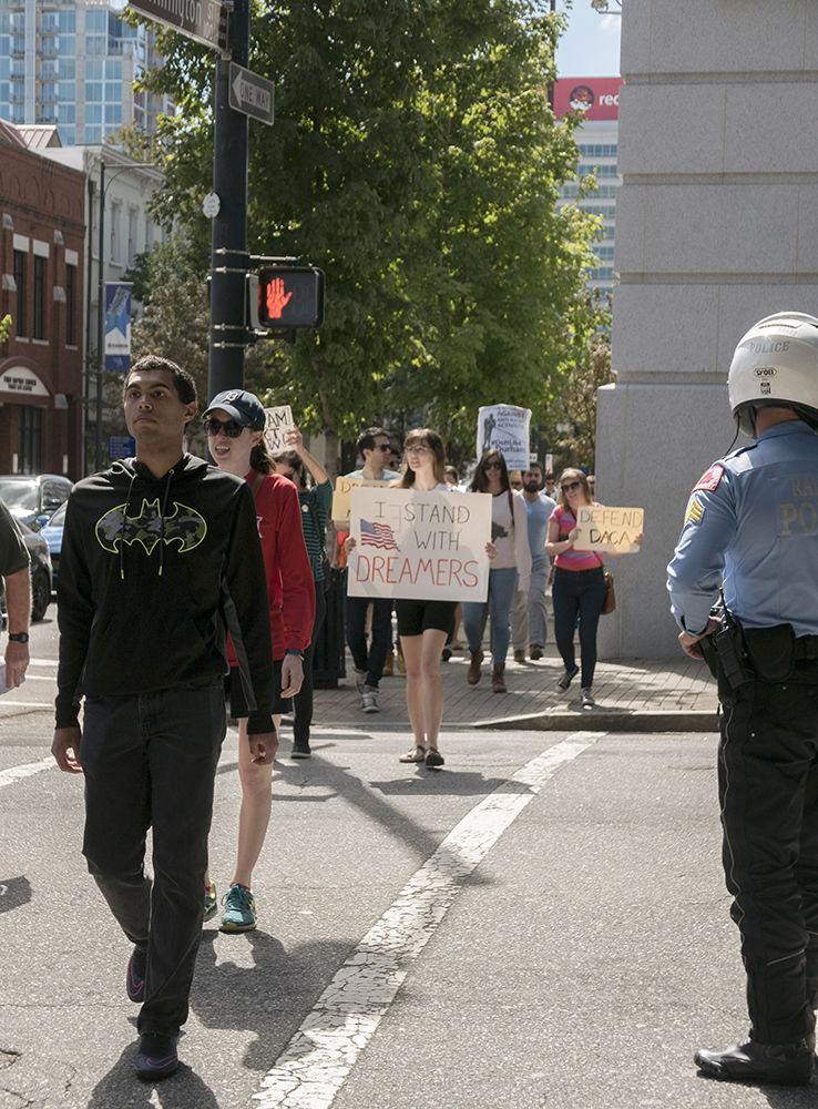 DACA supporters marching in Downtown Raleigh, NC on Sunday. The DACA March was organised by two second year NC State students Jasmine Wang studying Computer Science and Sindhoor Ambati studying English and biomedical engineering.