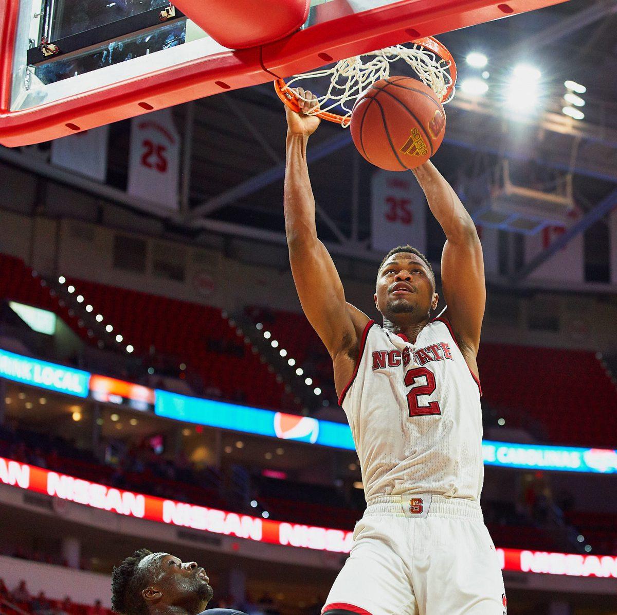 Redshirt junior Torin Dorn dunks the ball with 1:00 minute left in the second half against Robert Morris for a 81-65 win at PNC Arena on Tuesday, Dec. 19. Dorn recorded a double-double leading the team with 17 points while also putting up 10 boards.