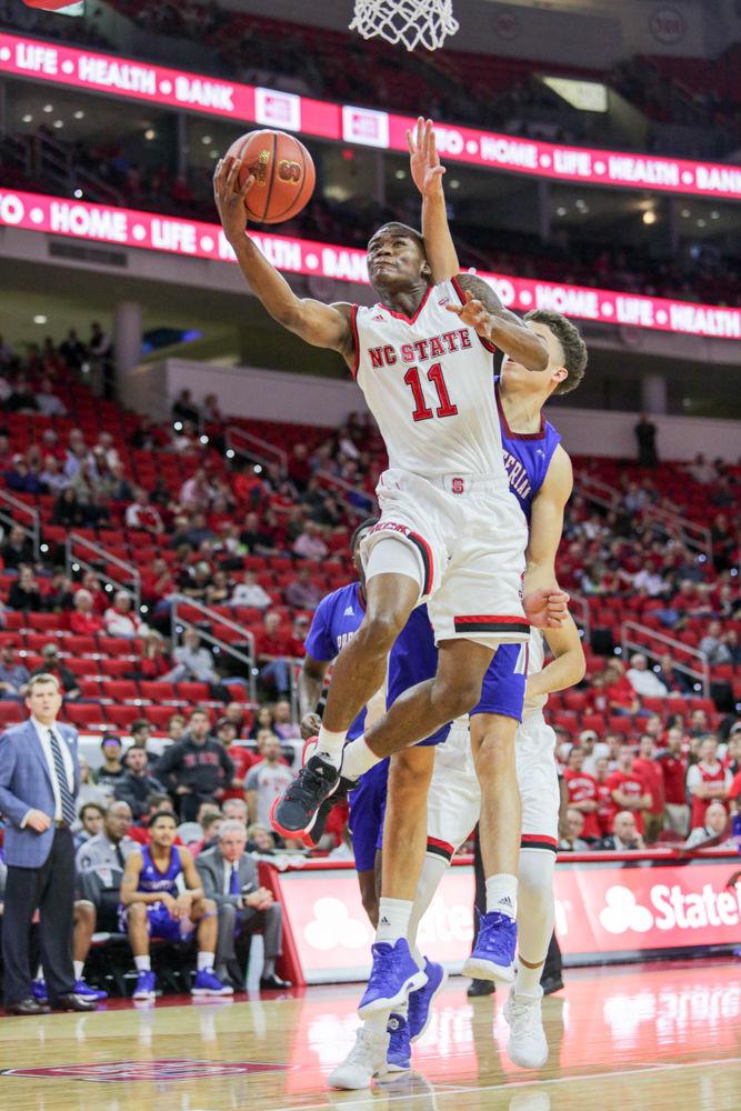 Sophomore guard Markell Johnson goes up for a quick layup. Johnson had ten points and a team high seven assists during the 86-68 win over Presbyterian College on Thursday, Nov. 16 in PNC Arena.