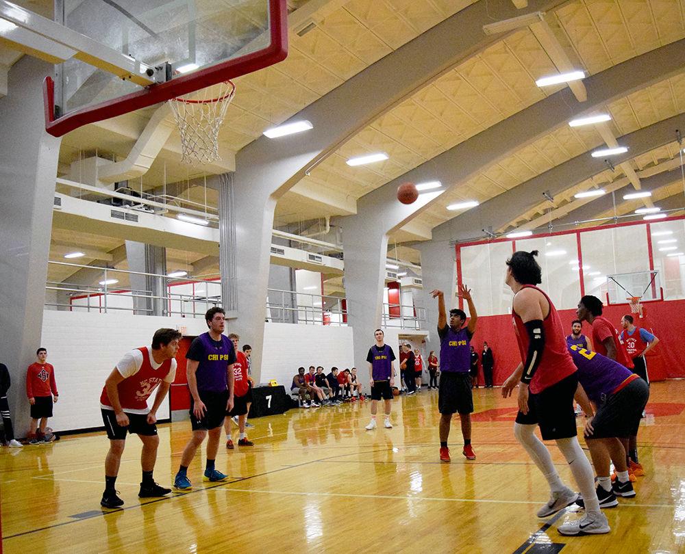 A player from the Chi Psi intramural basketball team shoots a free throw during a game against Delta Kappa Epsilon in Carmichael Gymnasium on Tuesday. Basketball, cricket, ultimate frisbee and volleyball are some of the intramural sports offered to all students and faculty at NC State.