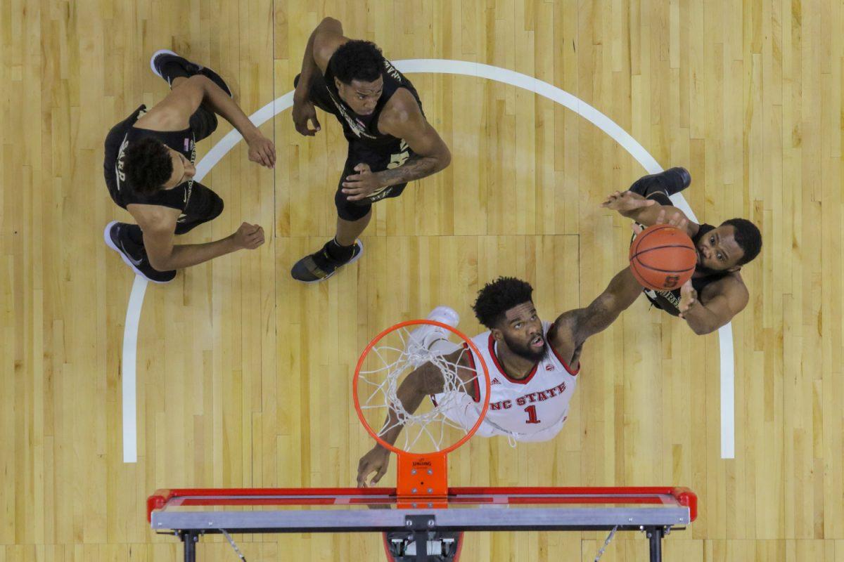 Redshirt senior forward Lennard Freeman goes up for a rebound. Freeman had six rebounds during the 72-63 win over Wake Forest on Thursday in PNC Arena.