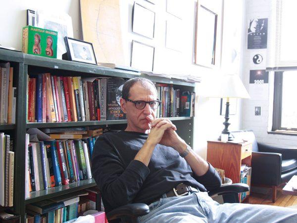 John Kessel, author of “Corrupting Dr. Nice,” sits in his office in Tompkins Hall on Jan. 30, 2013. The award-winning professor teaches science fiction and fantasy for the English department. "I have many books from students that have gone through my classes and have gone on to be published," Kessel said.