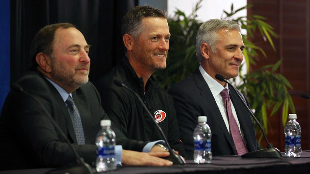 NHL commissioner Gary Bettman (left), Carolina Hurricanes majority owner Tom Dundon (middle) and Canes general manager Ron Francis (right) address the media at PNC Arena during Dundon&#8217;s introductory press conference.&#160;