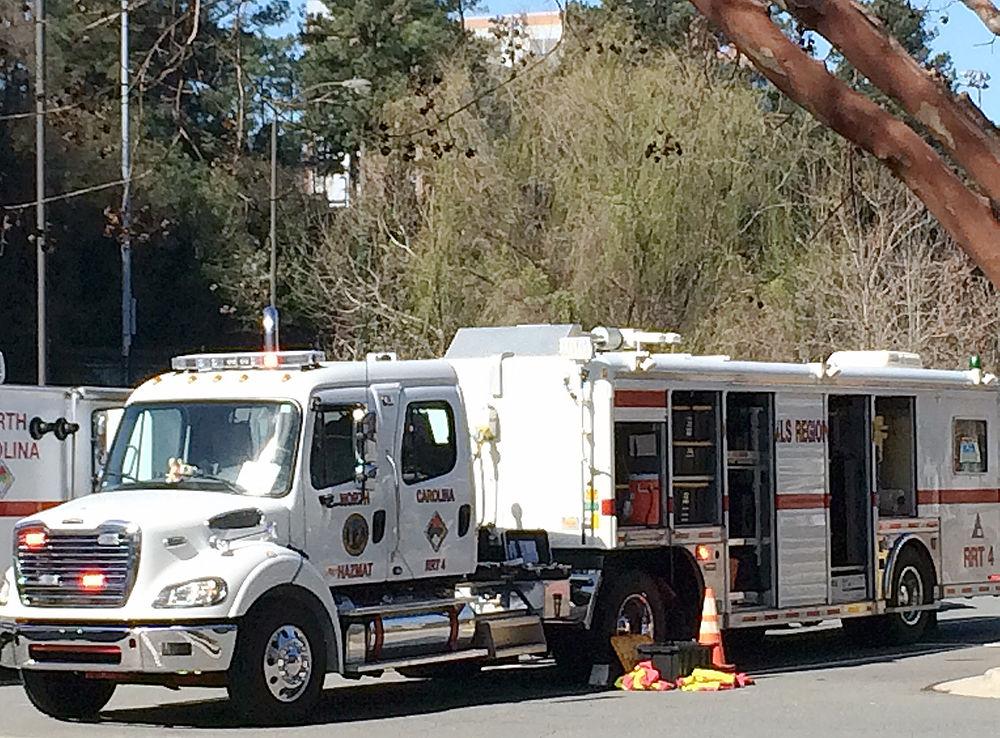 A hazmat truck sits in the parking lot of the Casey Aquatics Center during an emergency safety drill on Monday. University administration worked with police, fire, EMS and hazmat divisions from NC State and Wake County to coordinate an emergency safety drill testing the university and first responders&#8217; response to a potential hazmat emergency.