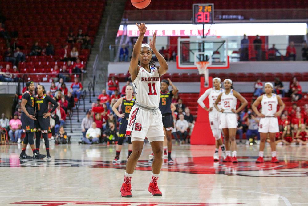 Redshirt junior guard and former Maryland player Kiara Leslie shoots free throws on the technical foul committed by Maryland's Brianna Fraser. Leslie had a career day with a double-double, leading all players in both points and assists with 21 and 11 respectively. The Wolfpack had a strong defensive outing holding No. 16 Maryland to 20 points less than their season average shooting 0-5 from deep. The Wolfpack won 74-60 in Reynolds Coliseum on Sunday, March 18 and will advance to the sweet 16.
