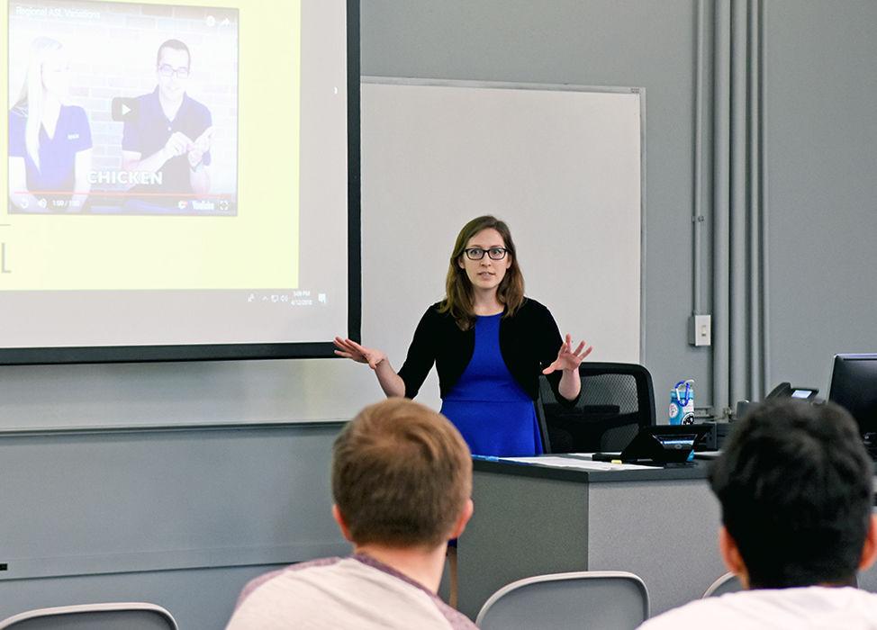 KellyNoel Waldorf, a graduate student studying English and a language diversity ambassador, explains that there is variation within American Sign Language during a panel called "American Sign Language: Dialects and Deaf Culture." The panel took place on Thursday in Winston Hall.