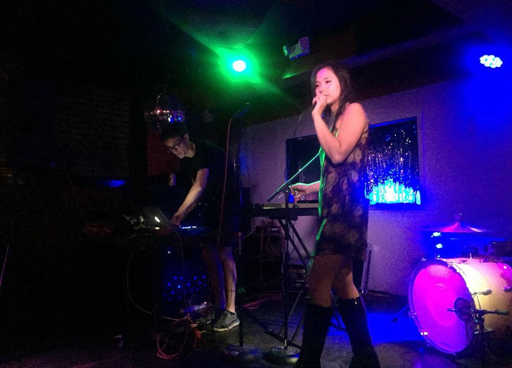 Phian Tran, an NC State alumna, performs as part of the group sl0wgl0w.