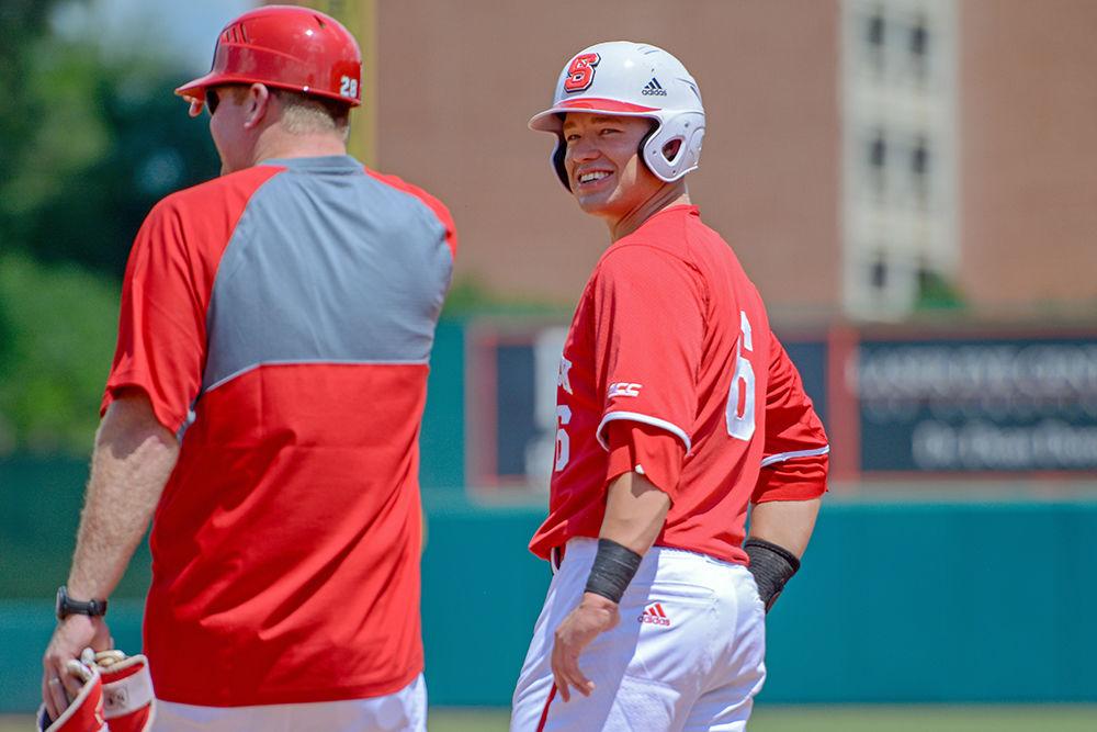 Junior outfielder Brett Kinneman smiles after making it to first base during the game versus Army on Sunday, June 3, 2018 at Doak Field. The Wolfpack beat the Black Knights 11-1.