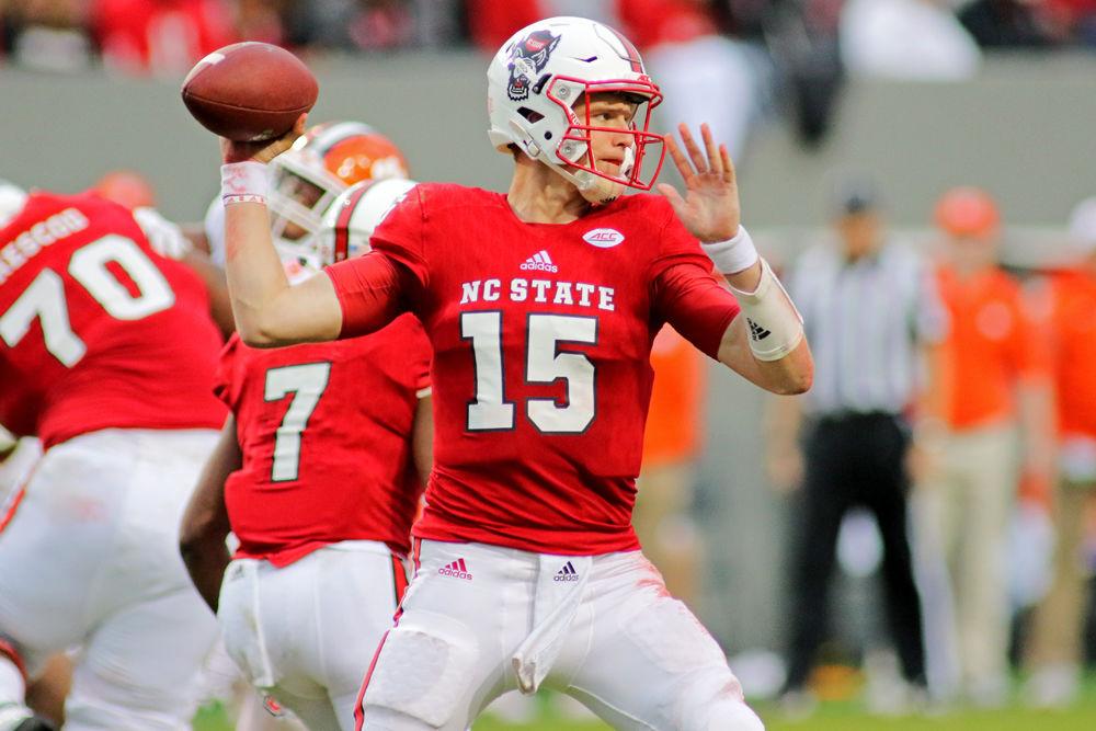 Graduate quarterback Ryan Finley pulls back to throw against Clemson on Nov. 4, 2017 at Carter-Finley Stadium. Finley passed for 338 yards and rushed for 35 more as the Wolfpack lost 38-31.