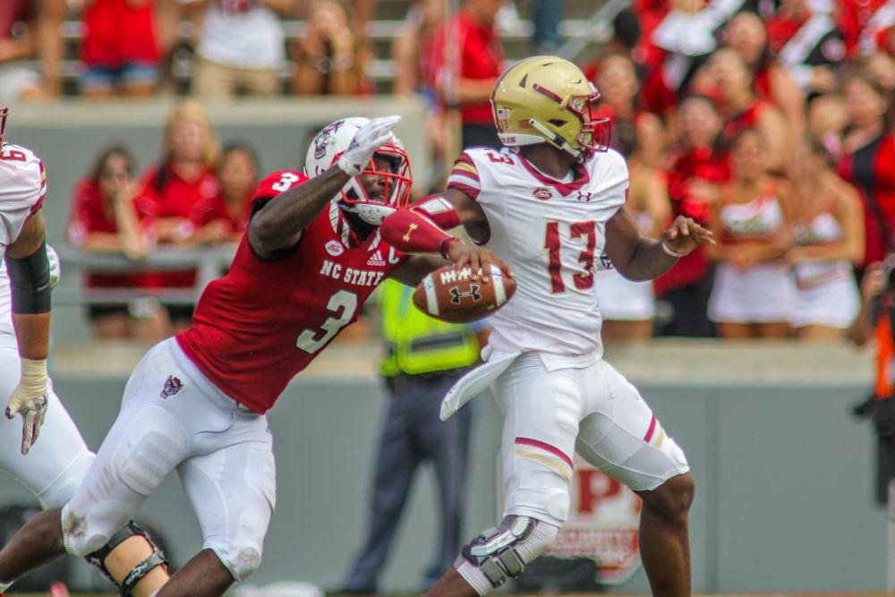 Graduate linebacker Germaine Pratt comes from behind to get the sack on Boston College quarterback Anthony Brown on Saturday, Oct. 6 in Carter-Finley Stadium. Pratt had 1.5 tackles for a loss, 1 sack and 1 forced fumble that he recovered. NC State survived a late Boston College resurgence for a 28-23 win.&#160;