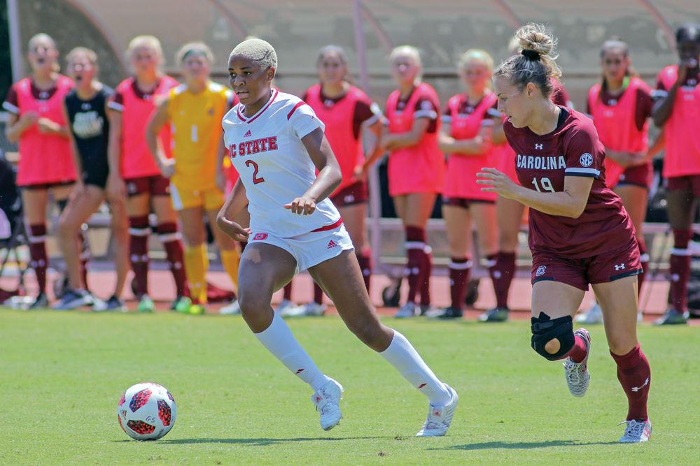 Junior midfielder Tziarra King cuts away from a defender on Sunday, Aug. 26 at Dail Soccer Stadium. The Wolfpack beat No. 10 South Carolina 2-1.