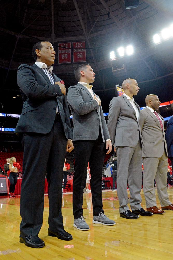 NC State Men&#8217;s Basketball&#8217;s coaching staff, led by Head Coach Kevin Keatts, stand for the national anthem on Monday, Oct. 29 at PNC Arena. The Wolfpack beat Chowan 111-62.