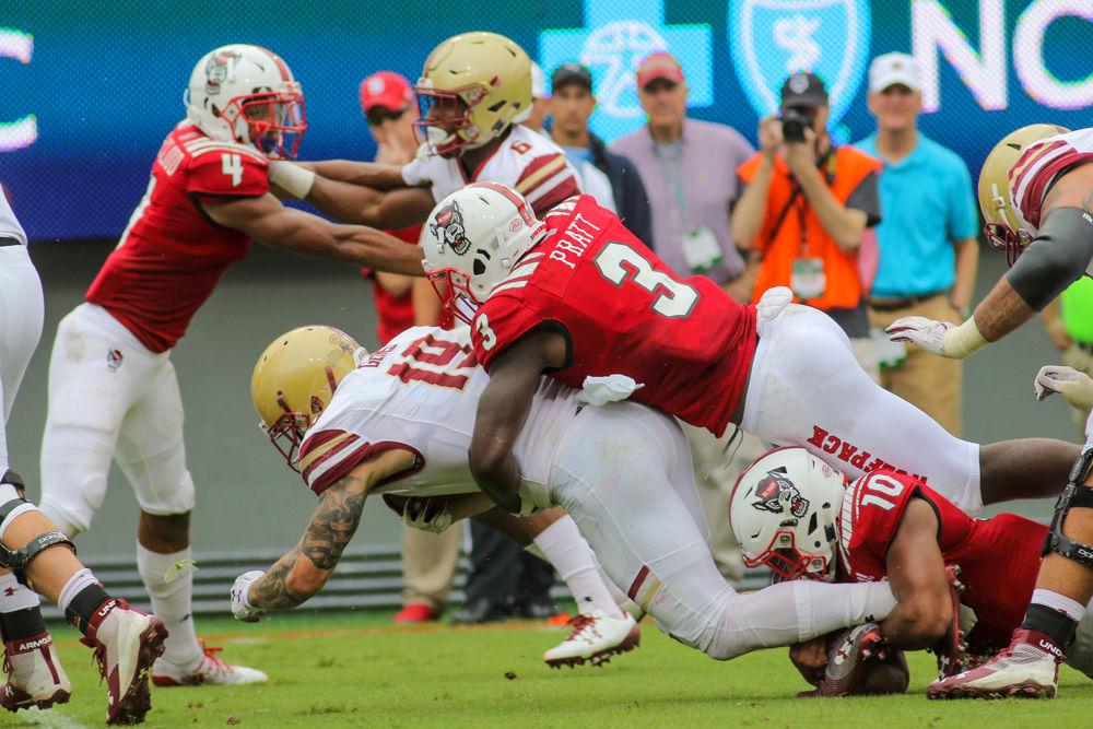 Graduate linebacker Germaine Pratt comes from behind to get the tackle on Boston College running back Ben Glines on Saturday, Oct. 6 in Carter-Finley Stadium. Pratt had 1.5 tackles for a loss, 1 sack and 1 forced fumble that he recovered. NC State survived a late Boston College resurgence for a 28-23 win.