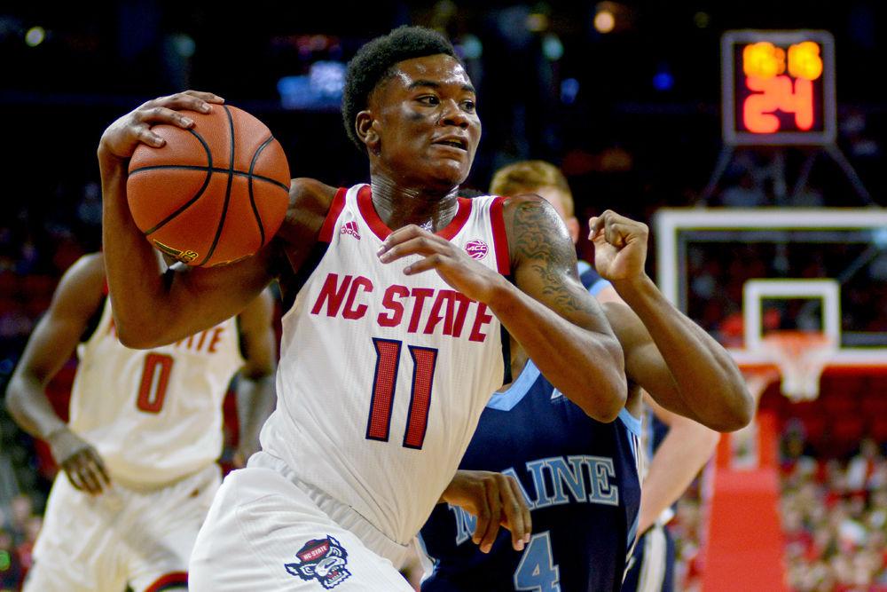 Junior guard Markell Johnson drives to the basket against Maine on Saturday, Nov. 17 at PNC Arena. Johnson recorded 13 points and five assists as the Wolfpack won 82-63.