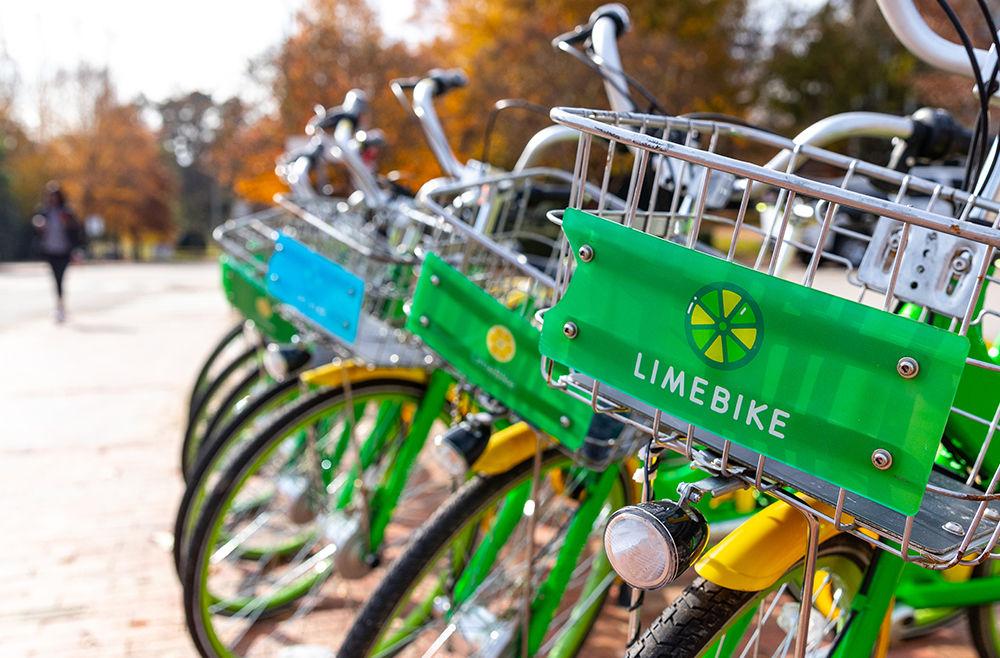 Lime bikes stationed outside Bragaw Hall on Monday, Dec. 3, 2018. Bragaw Hall is located on Dan Allen Drive.
