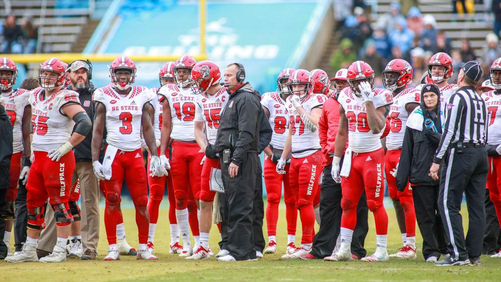 Head coach Dave Doeren and the team await review to see if redshirt junior wide receiver Jakobi Meyers had made a catch in bounds. Review found that Meyers completed the acrobatic catch on the way to 111 yards on seven receptions. The Wolfpack struggled but found a way to win over UNC in overtime to the tune of 34-28 on Saturday, Nov. 24 in Kenan Memorial Stadium.