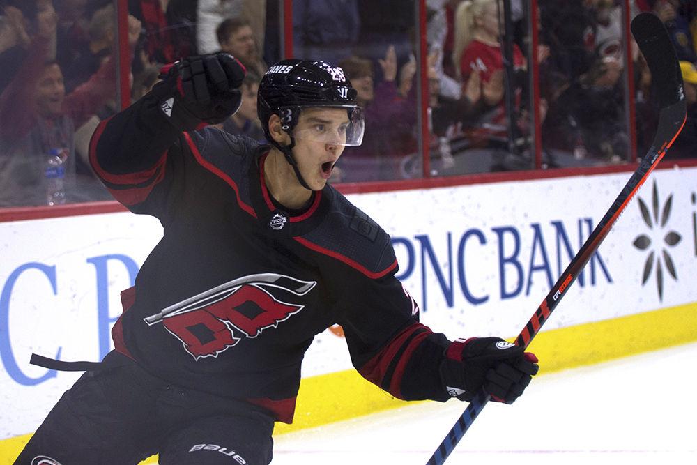Centerman Sebastian Aho bails to celebrate an early goal in the first period against the Tennessee Predators in PNC Arena, Jan. 13. Aho hit a hat trick late in the third period, helping to ensure the 6-3 victory at home.&#160;