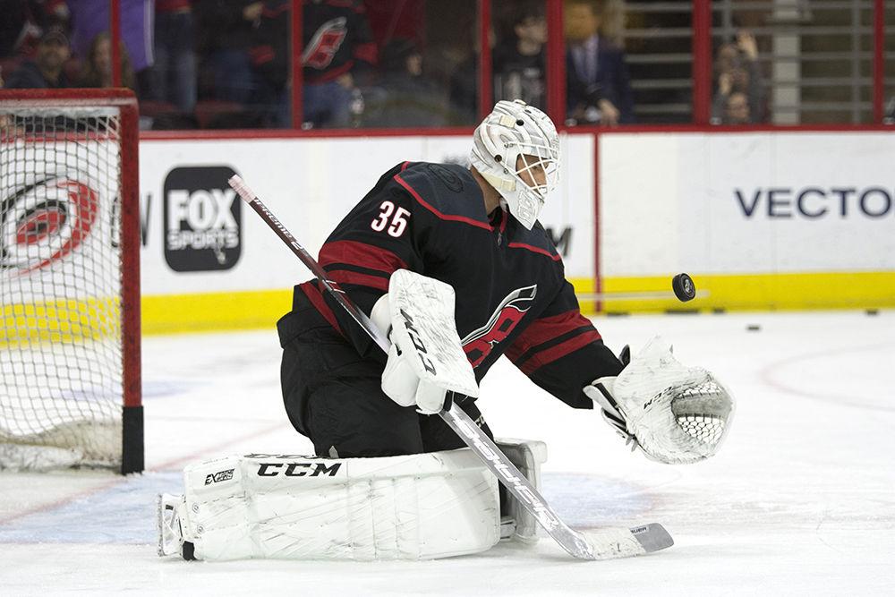 Carolina Hurricanes goal tender Curtis McElhinney catches the puck during warm-ups before the game against the Edmonton Oilers in PNC Arena, Friday, Feb. 15. Despite a well-fought first period, the Canes took the win 3-1.&#160;