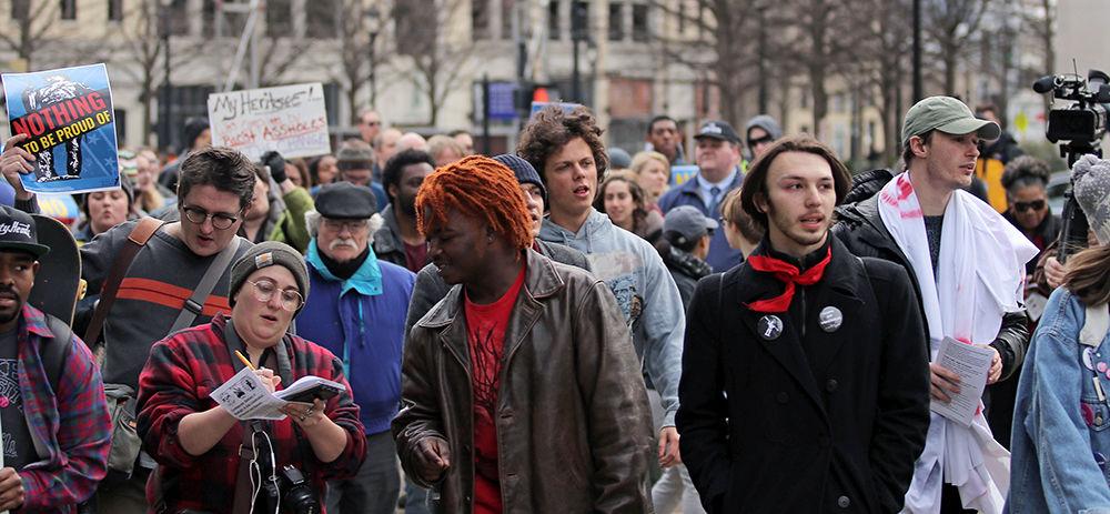 Demonstrators walked towards the Confederate monument at the Crush Confederates at the Capital event on Saturday, Feb. 9 at the North Carolina State Capitol in Raleigh.