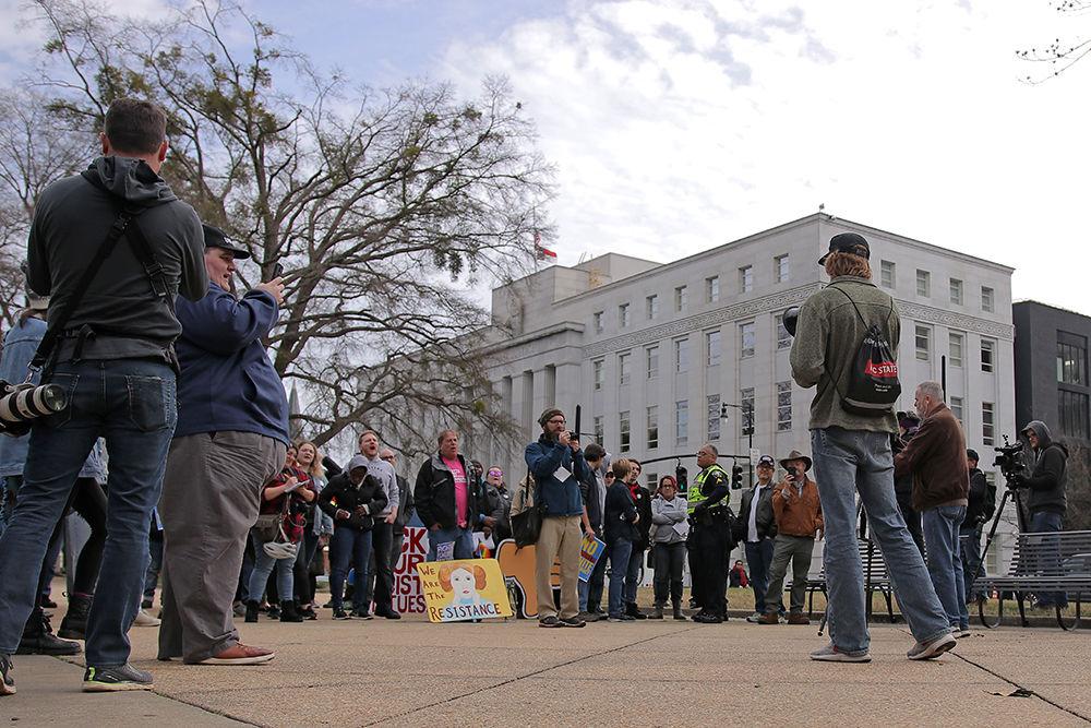 Jody Anderson, a fourth-year studying biological sciences, speaks to the crowd at the Crush Confederates at the Capital event on Saturday, Feb. 9 at the North Carolina State Capitol in Raleigh.