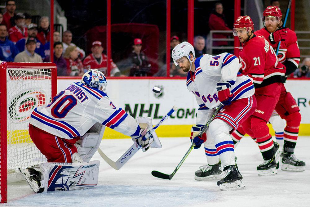 New York Rangers goalie Henrik Lundqvist blocks a Carolina Hurricane goal attempt on Tuesday, Feb. 19 in PNC Arena. Lundqvist blocked 43 shots made by the Hurricanes and only allowed one goal during the entire game. The Hurricanes lost to the New York Rangers 2-1.