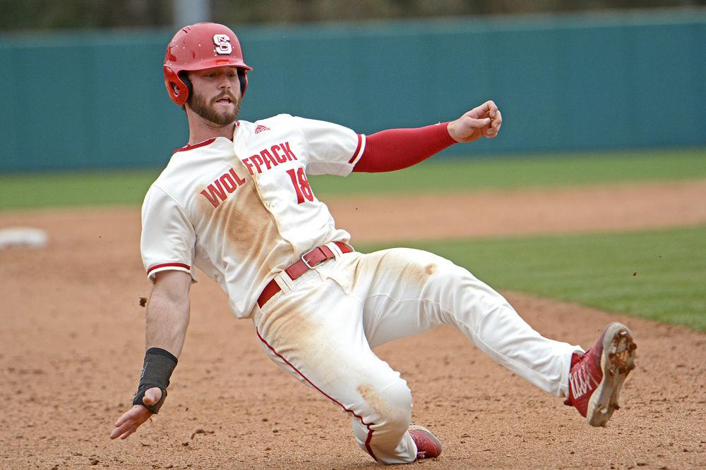 Senior infielder Evan Edwards slides into third base on Sunday, March 3, 2019 at Doak Field. Edwards went 4-5 with two doubles, two runs scored and one run batted in in the Wolfpack's 5-4 walk-off win over Minnesota.