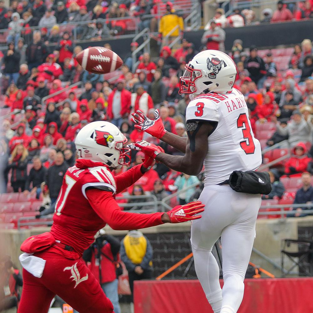 Junior wide receiver Kelvin Harmon goes up over the defender for a touchdown grab. Harmon had seven receptions for 100 yards&#160;during the 52-10 rout of Louisville on Nov. 17 in Cardinal Stadium.