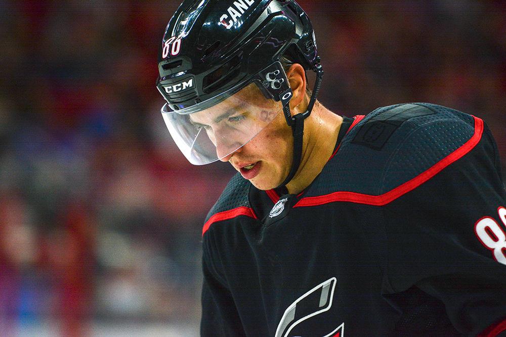 Carolina Hurricanes forward Teuvo Teravainen looks down at the ice during the game versus the New York Rangers on Oct. 7, 2018 in PNC Arena. The Canes beat the Rangers 8-5.