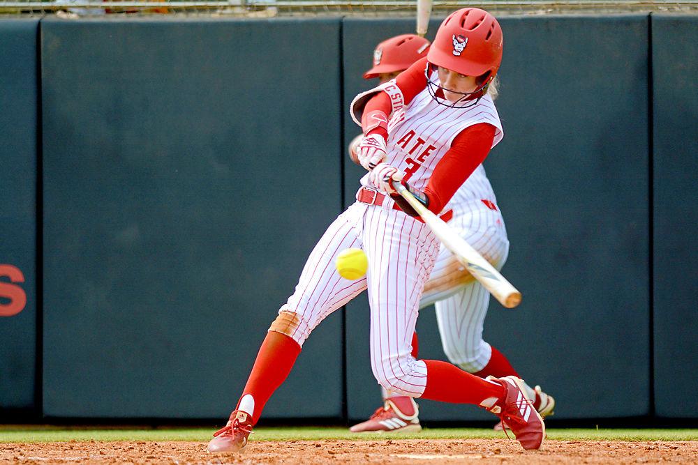 Sophomore outfielder Sam Russ hits the ball against Virginia Tech on Saturday, March 16, 2019 at Dail Softball Stadium. Russ went 1-2 with one double and one walk in the Wolfpack&#8217;s 12-1 loss to the Hokies.