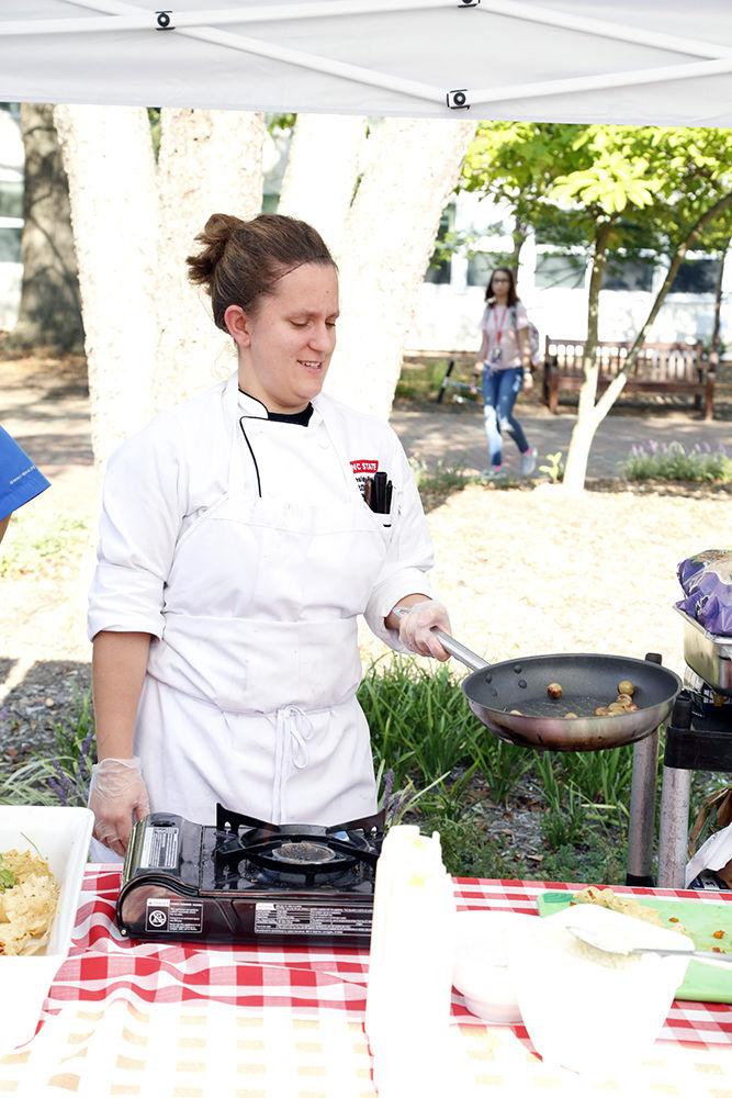 Lesley Schatz does a demonstration for students at the All Carolinas Meal on Tuesday, Sep. 10, 2019. The produce used in the demo was from local NC State agricultural facilities.