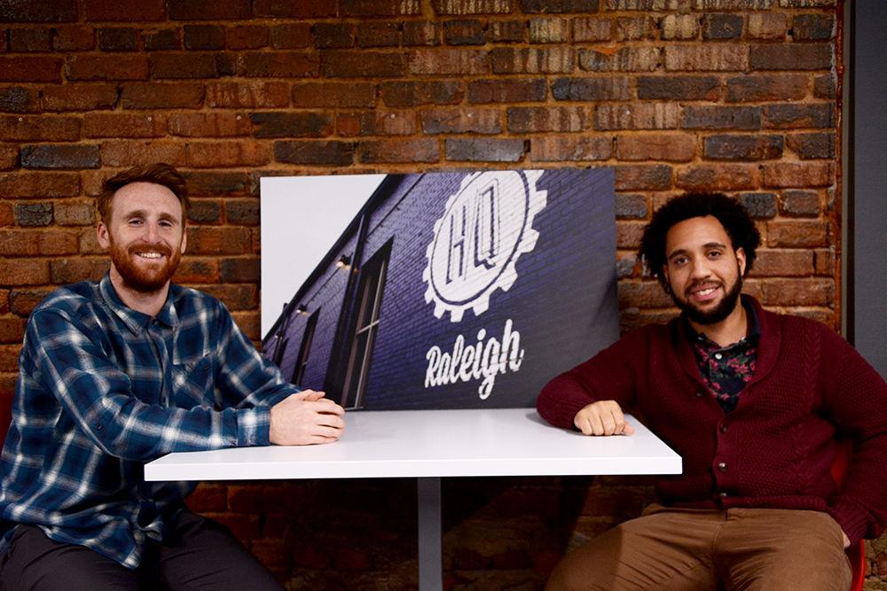 DeShawn Brown, a NC State alum, and Tanner Hallman, a University of North Carolina at Wilmington alum, sit in a conference room in their downtown Raleigh location on Nov. 13, 2019. Brown and Hallman cofounded Coworks, a company that develops software for managing co-working spaces.